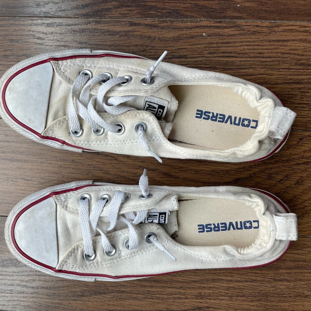 White slip on Converse sneakers
